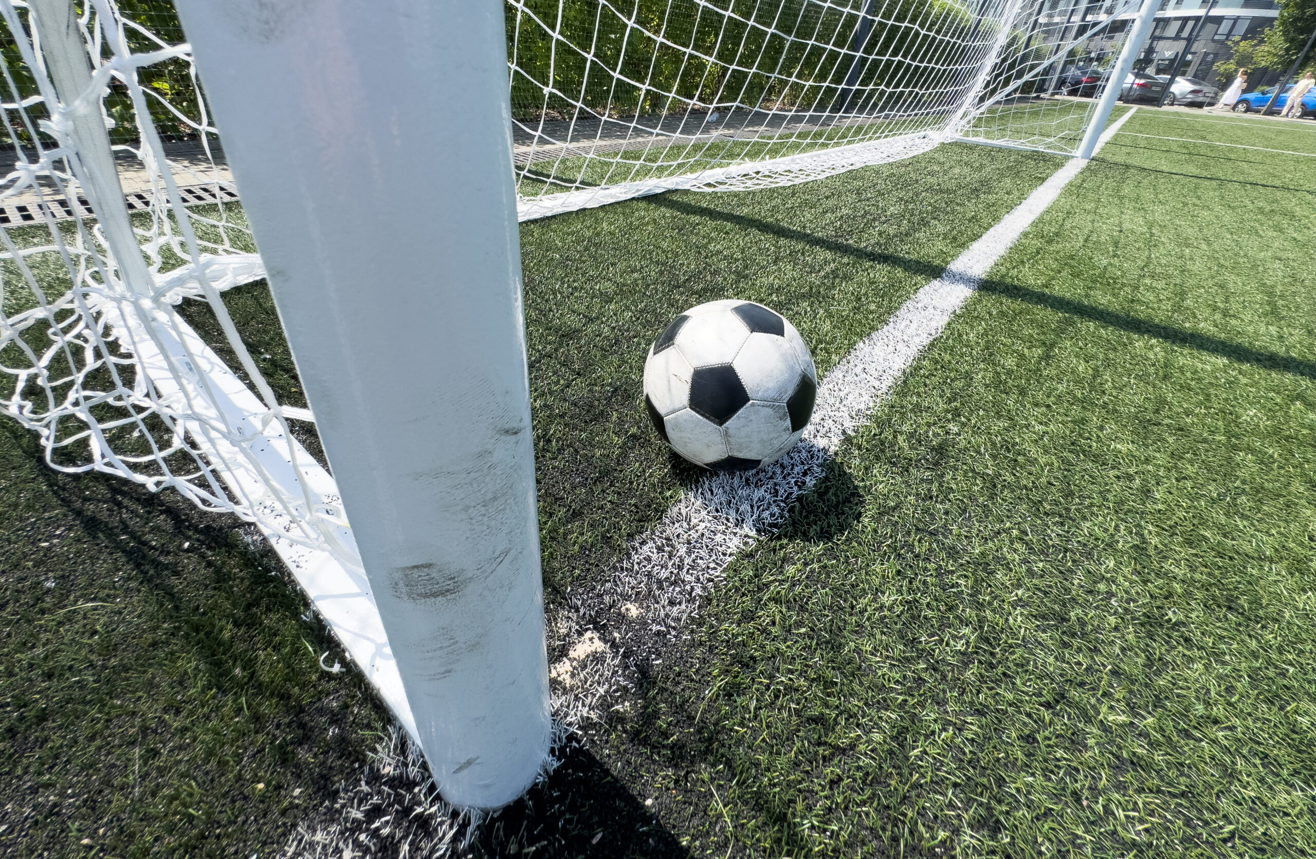 Soccer ball over the goal line